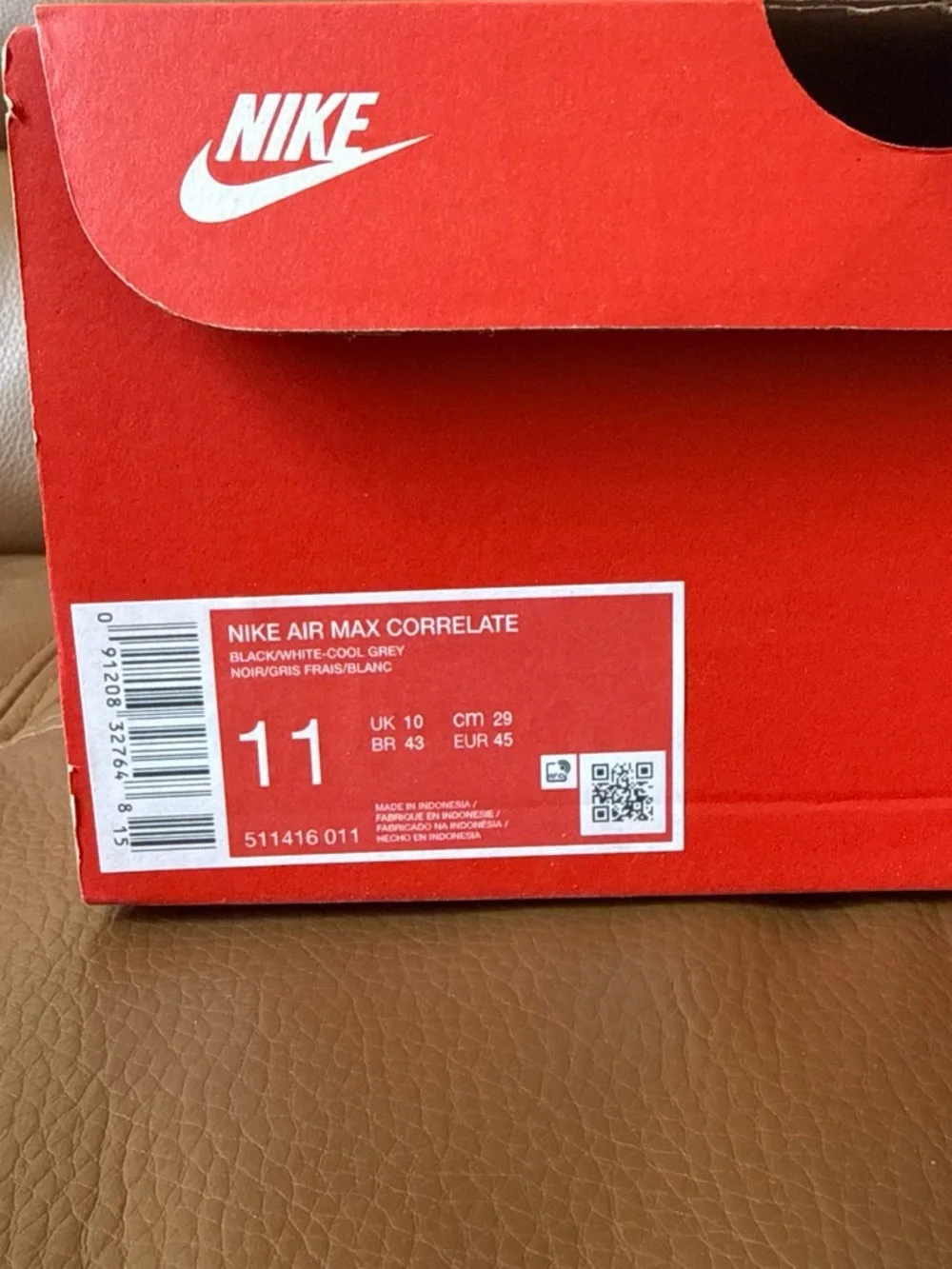 Nike Men’s Gray, White and Red Athletic Sneakers